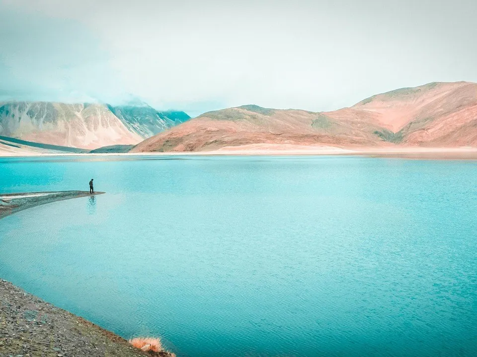 Turquoise water and barren mountains at Pangong Tso in Ladakh